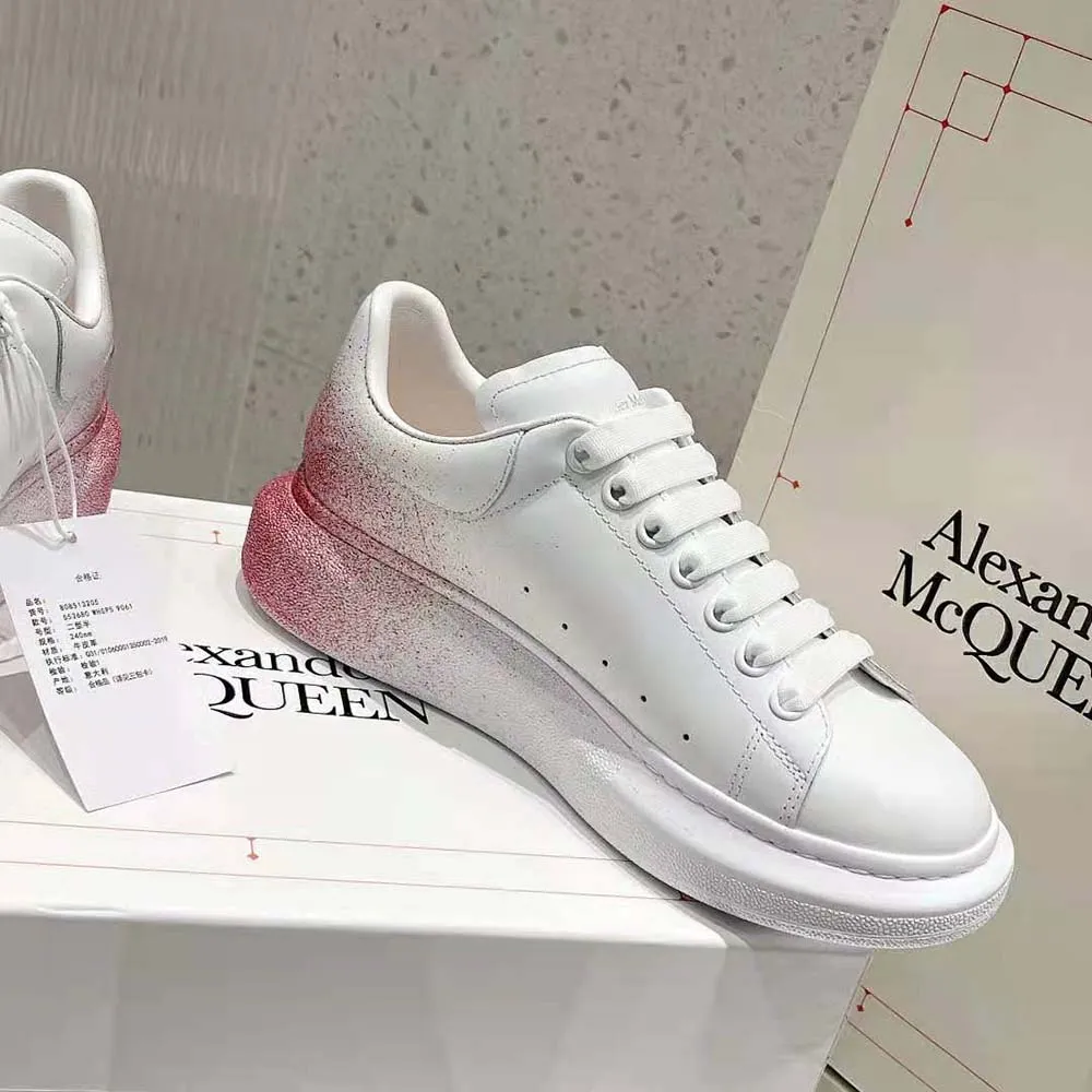 Alexander Mcqueen Zapatilla de deporte extragrande para mujer en blanco/rosa